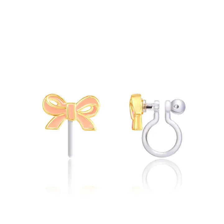 Hand-painted Pretty Pink Bow clip-on earrings for girls by Girl Nation Canada featuring soft, non-slip silicone clips. Designed for unpierced ears, these transparent clips provide a pain-free and pinch-free fit that is hypoallergenic and nickel-free for all-day comfort.