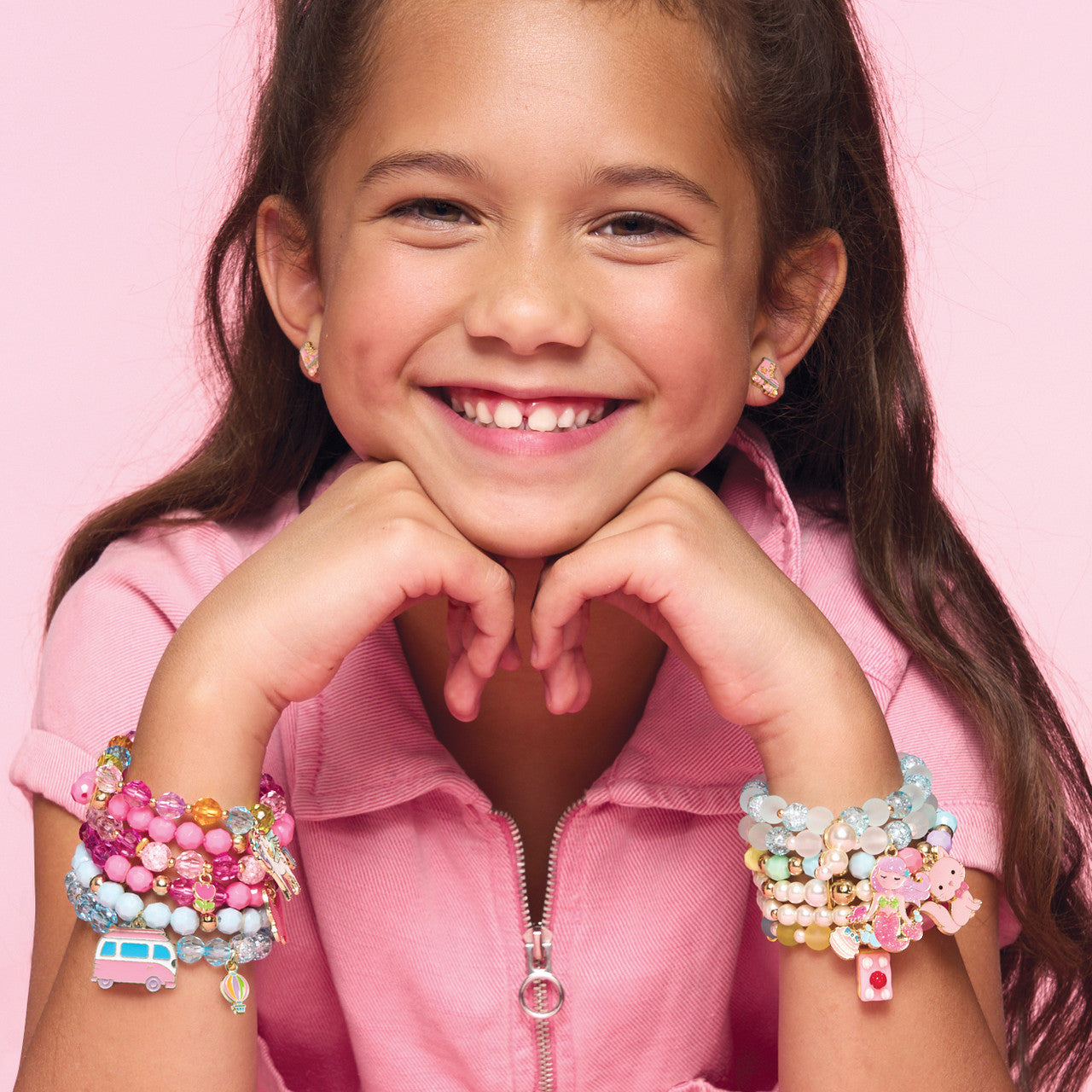 Retro-style pink roller skate stud earrings with orange star details, the perfect birthday or Easter basket gift for a granddaughter. High-quality, mom-designed jewelry from a premium Canadian kids brand celebrating active play and unique style.