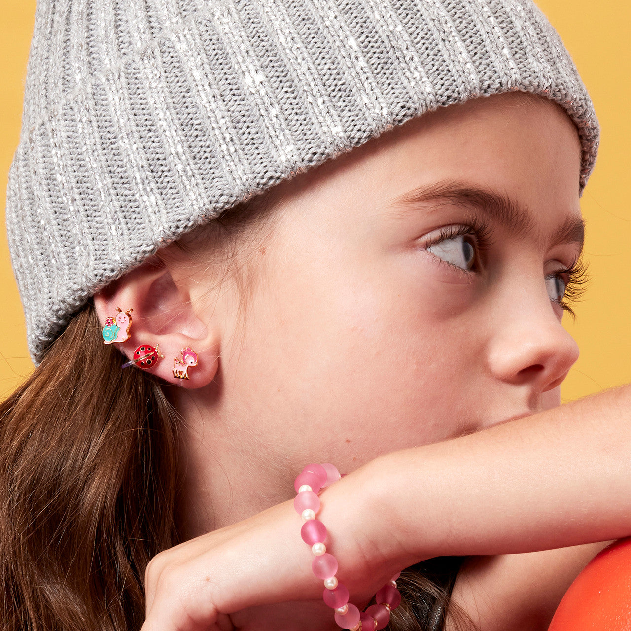 Classic Red Ladybug clip-on earrings for kids, featuring a hypoallergenic and pain-free design. A favorite animal jewelry gift for girls with unpierced ears.