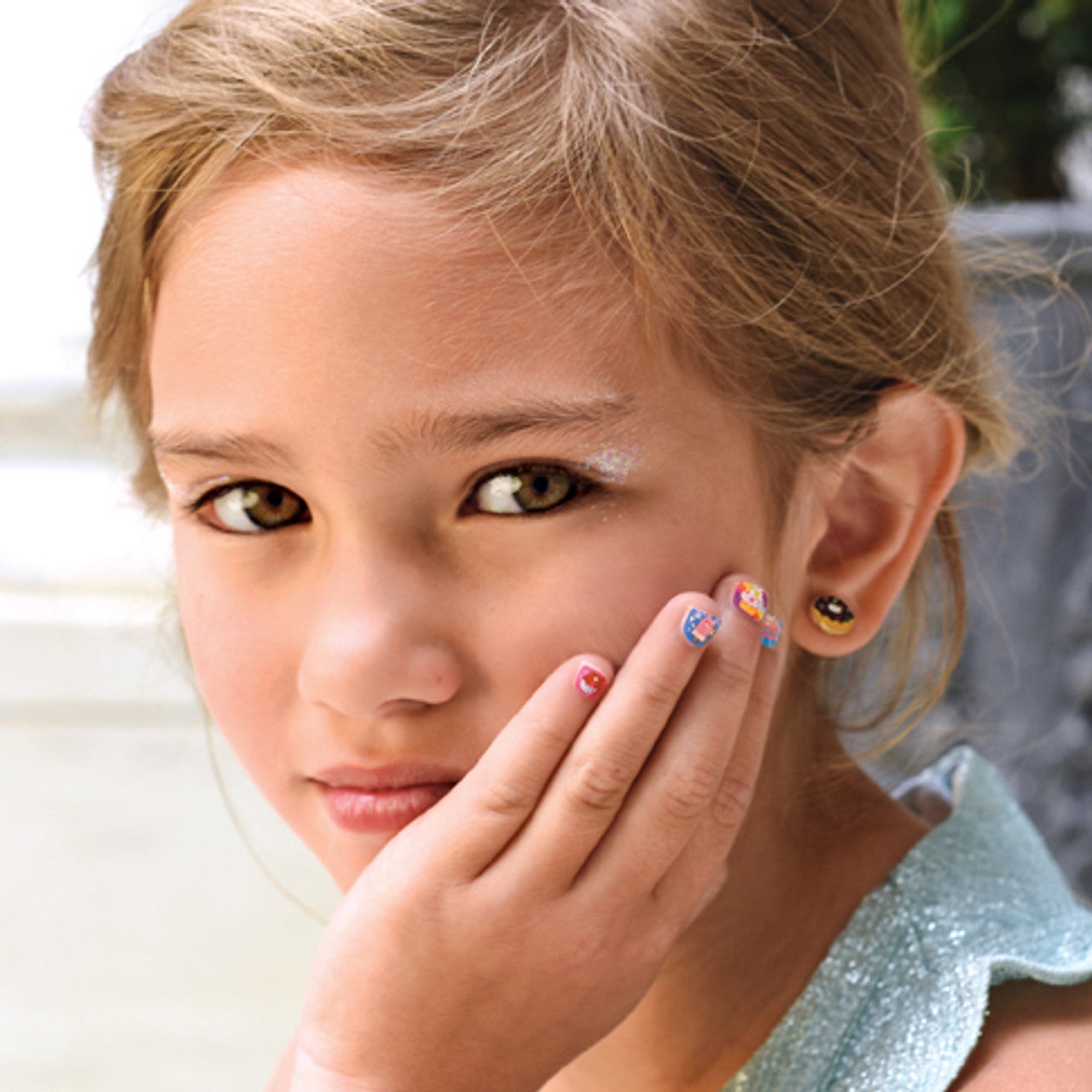 Adorable Donut clip-on earrings for girls, featuring a pain-free design and secure stay-on fit. A fun and hypoallergenic jewelry gift for children's birthdays.