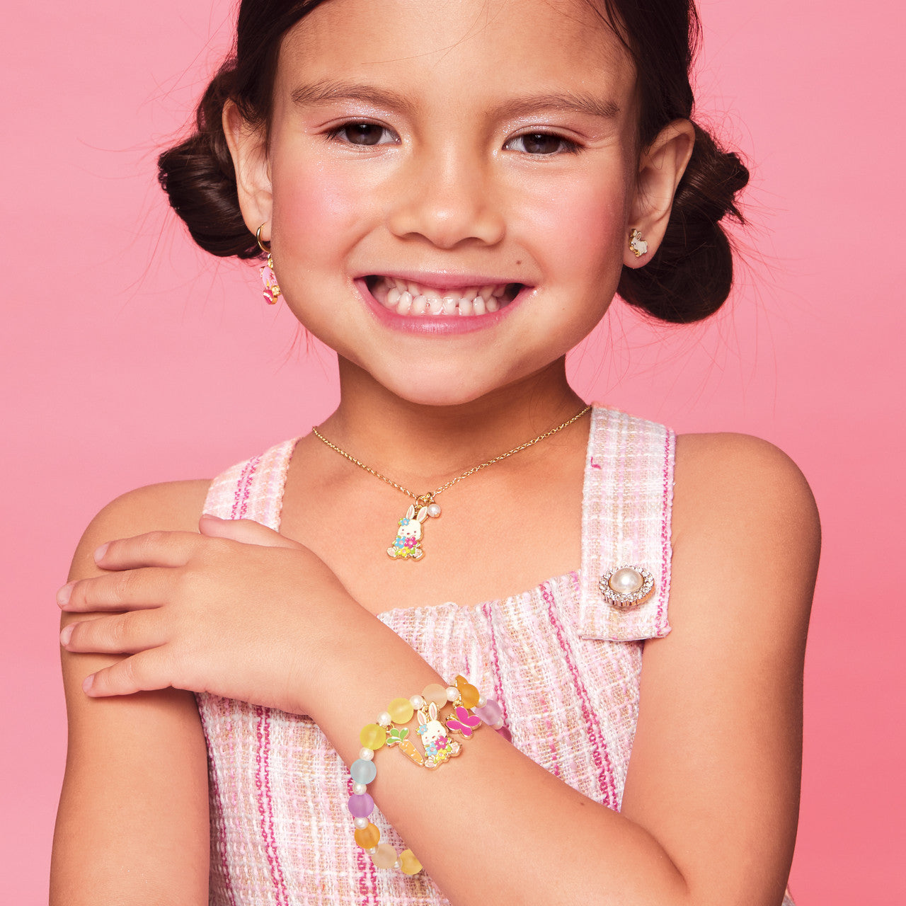 Sparkling Glitter Rabbit bunny stud earrings for kids, featuring a pain-free safety back and hypoallergenic surgical steel. A magical and safe gift-ready jewelry piece.