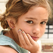 Deliciously scented Sweet Shop nail stickers for kids, featuring 25 cupcake and candy designs. A fun, sugar-free birthday gift for your granddaughter that releases a sweet scent when scratched.