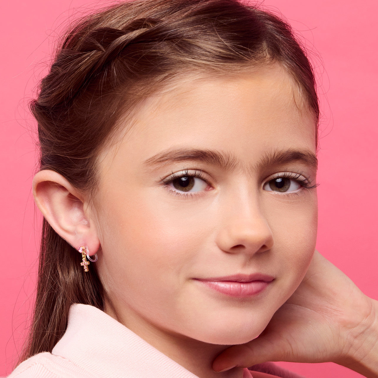 Elegant pink crystal cross dangle clip-on earrings for kids, fancy "It Girl" style religious jewelry for Easter Sunday and special church events. Sparkling hypoallergenic accessories for girls in Canada.
