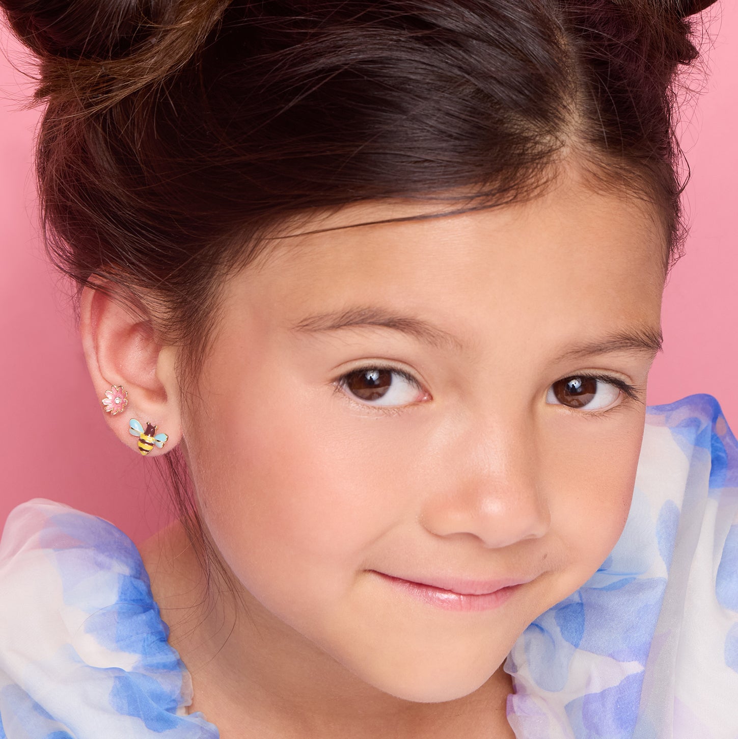 J321s05_girl-nation-earrings-pink-daisy-cutie-studs-worn-girl-1.jpg
