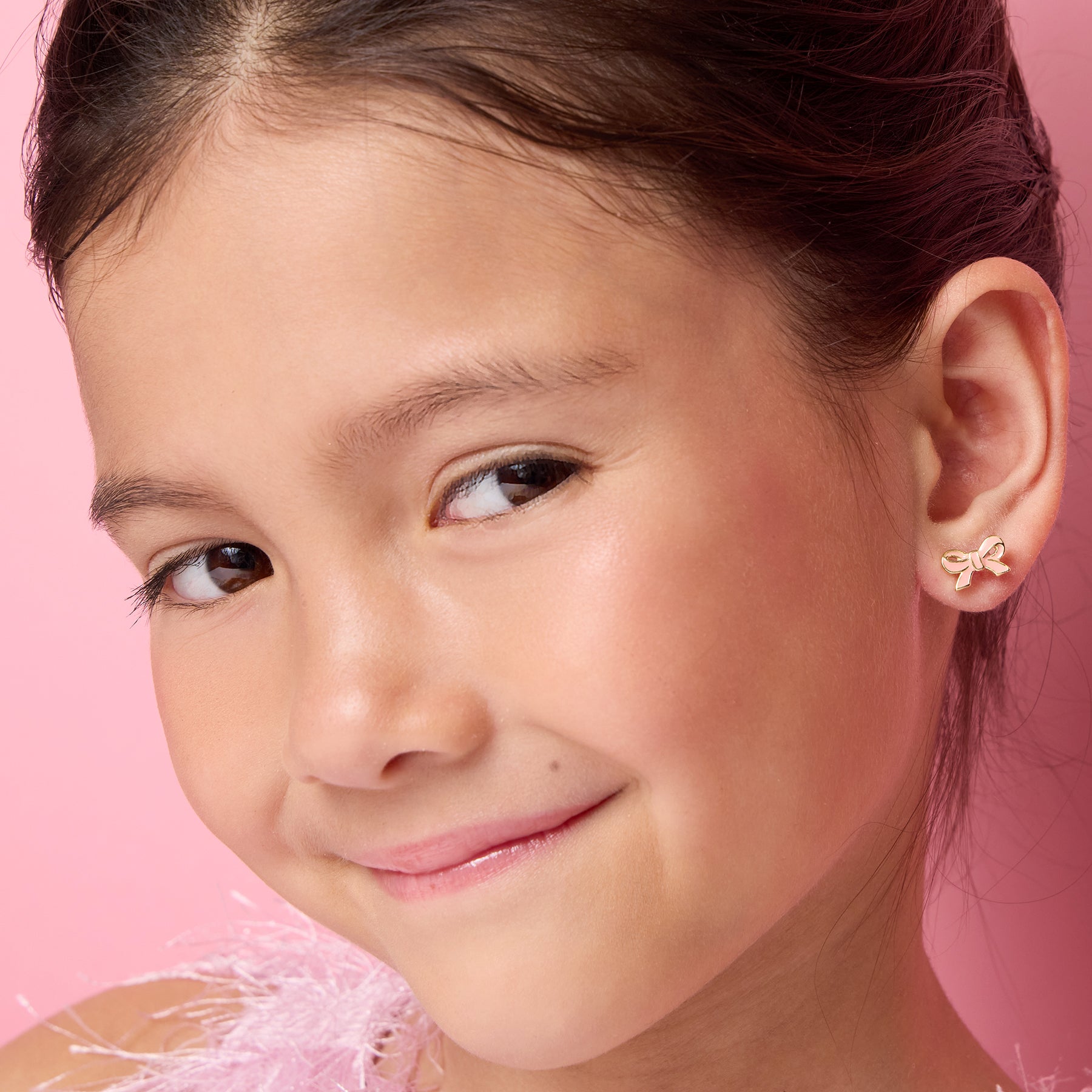 J341s05_girl-nation-earrings-pretty-pink-bow-cutie-stocks-worn-girl-1_2.jpg