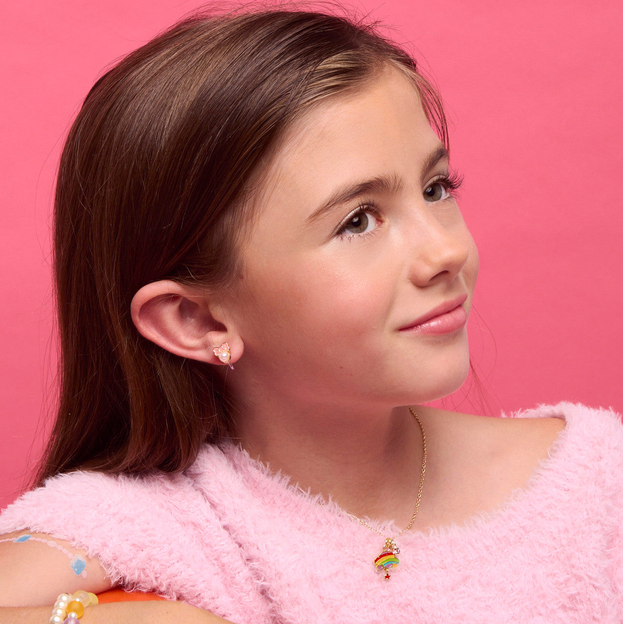 Elegant Pink Chic Bow clip-on earrings for girls, featuring a secure and pain-free clip-on design. A premium gift-set addition for kids with sensitive, unpierced ears.