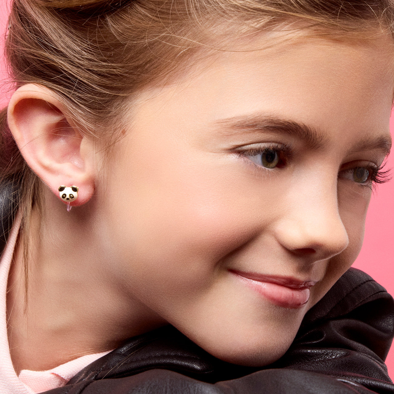 Detailed view of the lamb design and the soft-pressure clip back, providing an irritation-free jewelry experience for children.