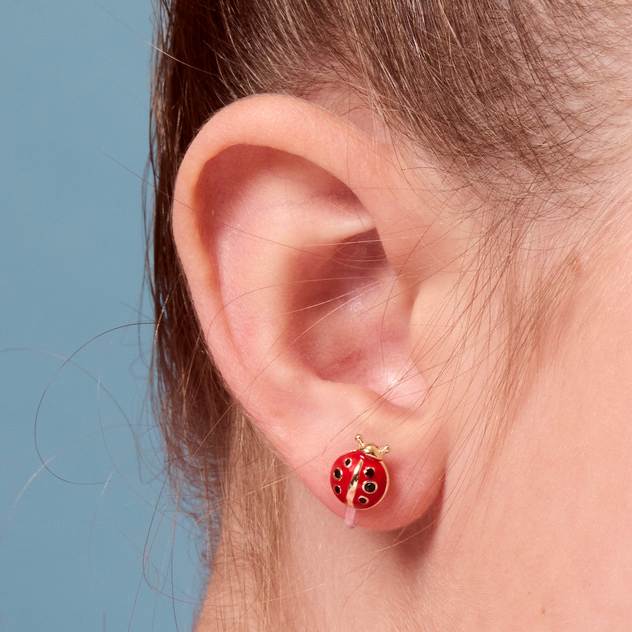 Classic Red Ladybug clip-on earrings for kids, featuring a hypoallergenic and pain-free design. A favorite animal jewelry gift for girls with unpierced ears.