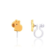 Golden-brown capybara charm clip-on earring with gold enamel outline, transparent silicone clip, front and side view