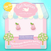 Detailed view of the pink pear design and the high-quality clip-on mechanism, providing a safe, stay-on, and pain-free jewelry experience for children.