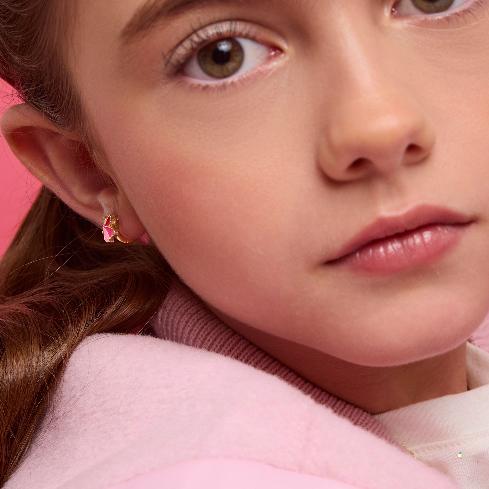 Premium 18K gold plated Butterfly huggie earrings for kids, featuring a secure stay-on hoop. A safe, hypoallergenic gift for your granddaughter's birthday or holiday.