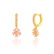 18K gold plated huggie earrings with pink CZ flower charm, pair view