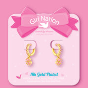 Pink flower charm huggie earrings on Girl Nation display card, hypoallergenic and nickel-free