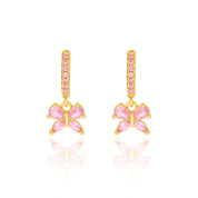 18K gold plated huggie earrings with pink CZ butterfly charm, pair view