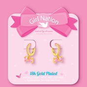 Pink bow charm huggie earrings on Girl Nation display card, hypoallergenic and nickel-free