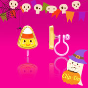 Detailed shot of the candy corn design showing the gentle-pressure clip back that keeps the earrings safely in place during holiday celebrations.