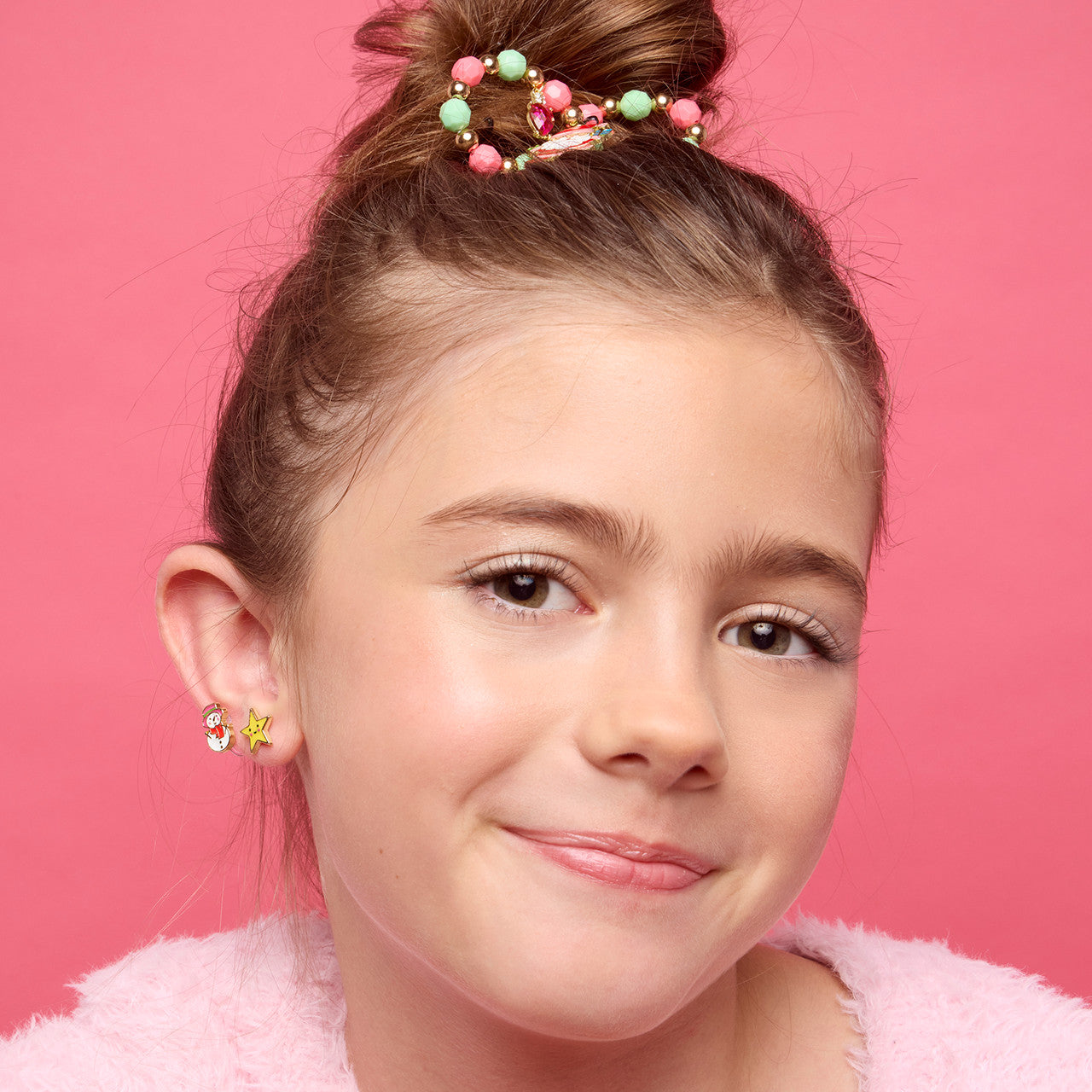 Festive Snowman Wonderland clip-on earrings for kids, featuring a pain-free design and secure fit for holiday celebrations.