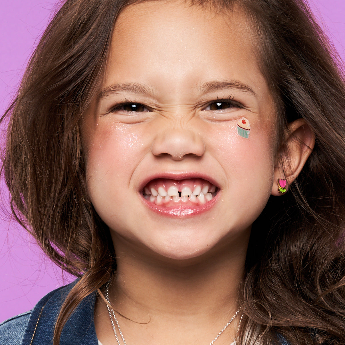 Detailed view of the pink tulip design with a gentle-pressure clip that keeps the jewelry safely in place without discomfort.