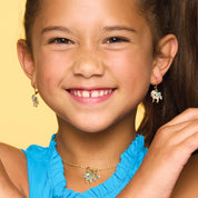 Close-up of the unicorn pendant showing shimmering crystal details. Lead and nickel-free jewelry for kids 5+, ensuring comfort and safety.