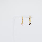 18K gold plated pink heart charm huggie earrings rotating on display, video
