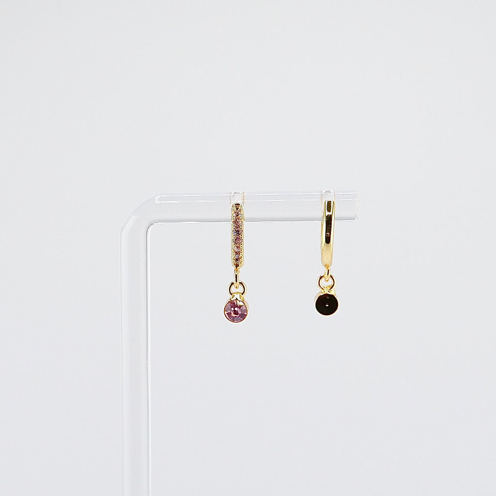 18K gold plated pink solitaire drop huggie earrings rotating on display, video
