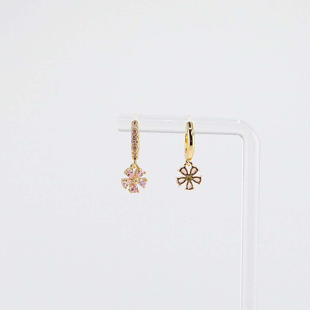18K gold plated pink flower charm huggie earrings rotating on display, video
