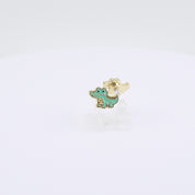 Green crocodile charm clip-on earrings rotating on display, video