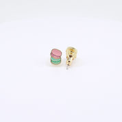Pink and mint macaron stud earrings rotating on display, video