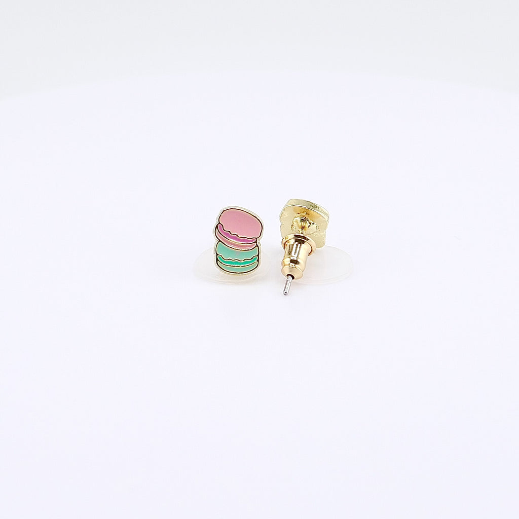 Pink and mint macaron stud earrings rotating on display, video